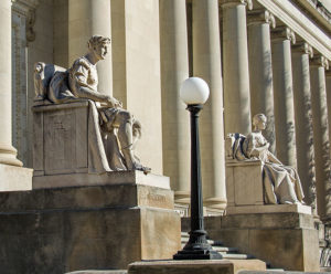 Limestone figures at the entrance to the Memphis Courthouse - Authority and Liberty