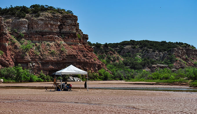 Pete Quaid Painting in the Pease River