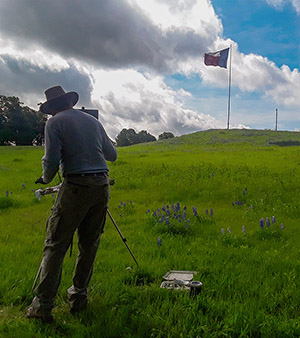 Pete Quaid painting the Texas Bluebonets